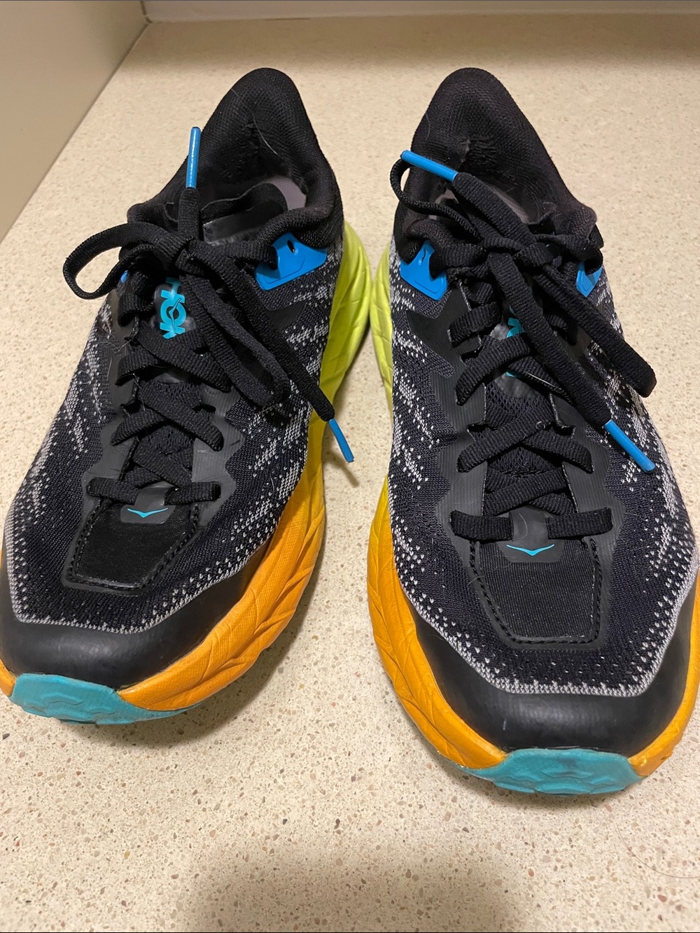 Black Hoka  Running Shoes with Yellow , orange andTeal Accents